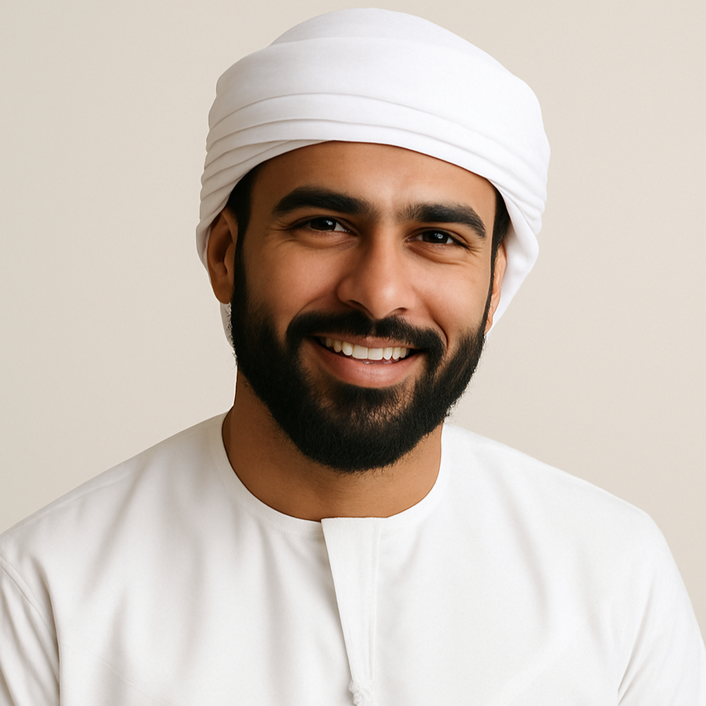 Man wearing a white thobe and turban with 'Hamad Al Shamsi' and 'Abu Dhabi' text below.